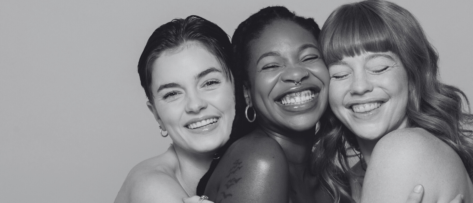 three woman smiling
